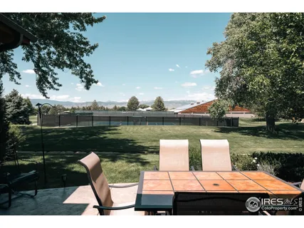 a view of house with yard