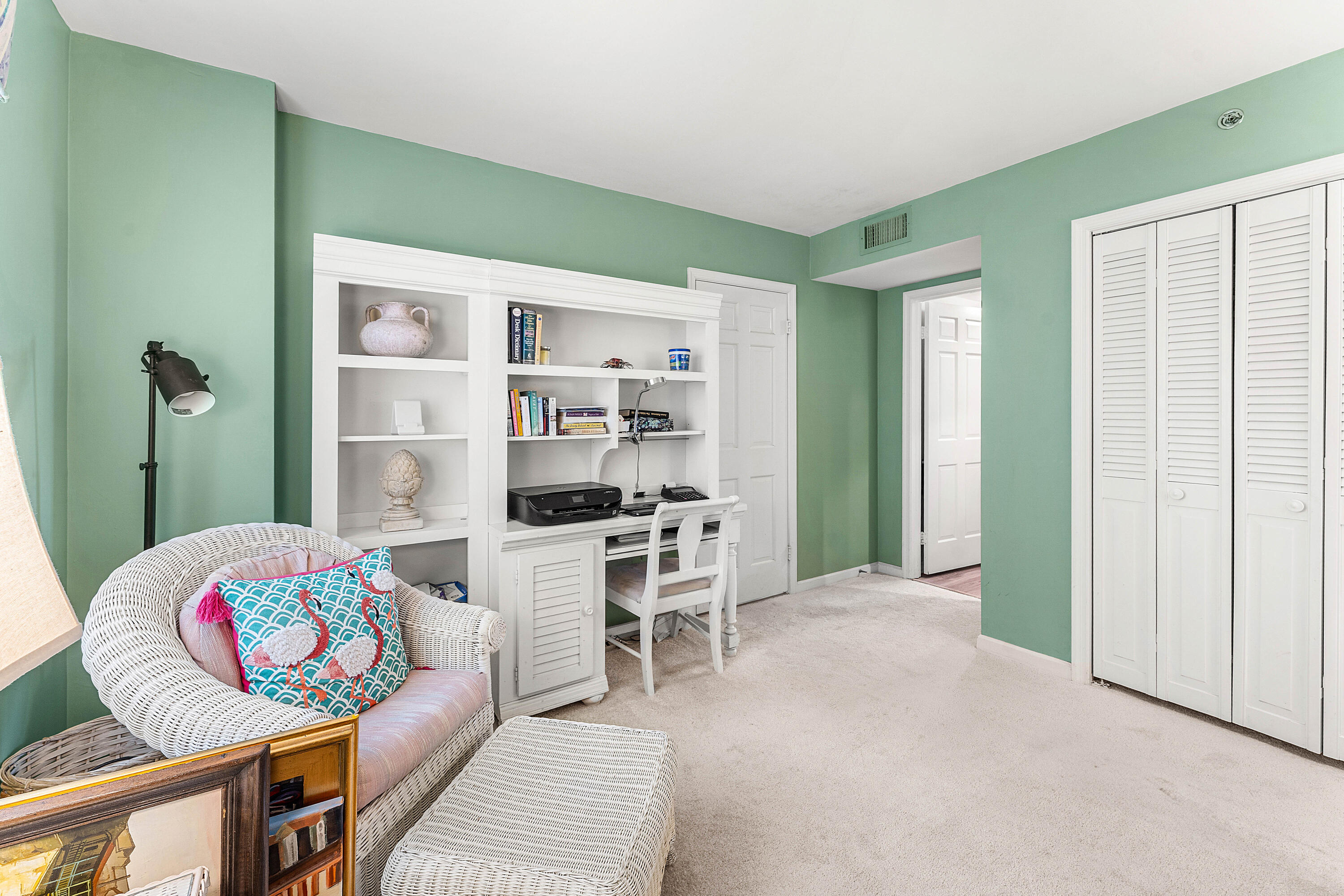 100 South Beach Road, Unit 602 Tequesta, FL 33469 - Photo 20 of 57 a living room with furniture and a table