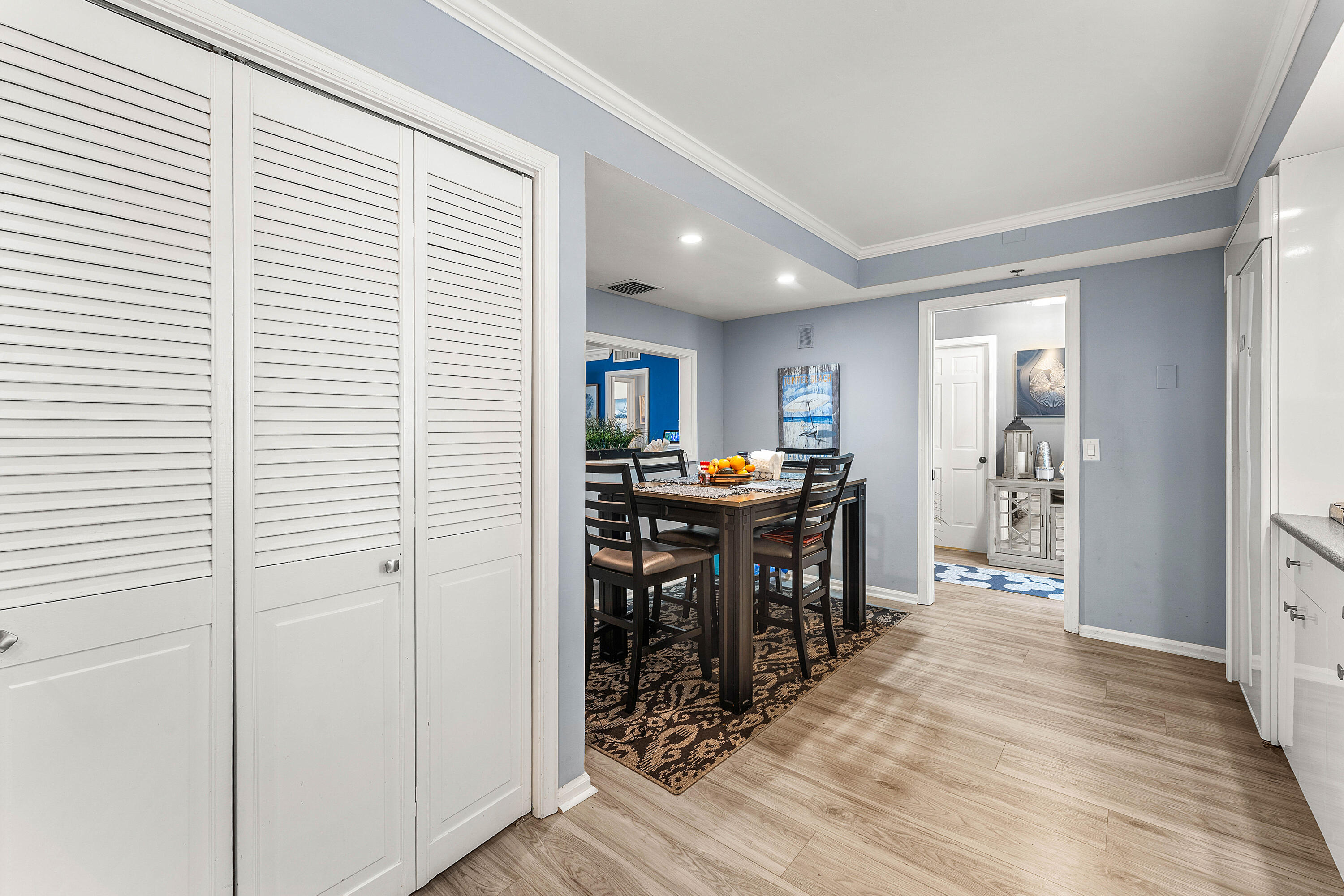 100 South Beach Road, Unit 602 Tequesta, FL 33469 - Photo 8 of 57 a view of a dining room with furniture and a window
