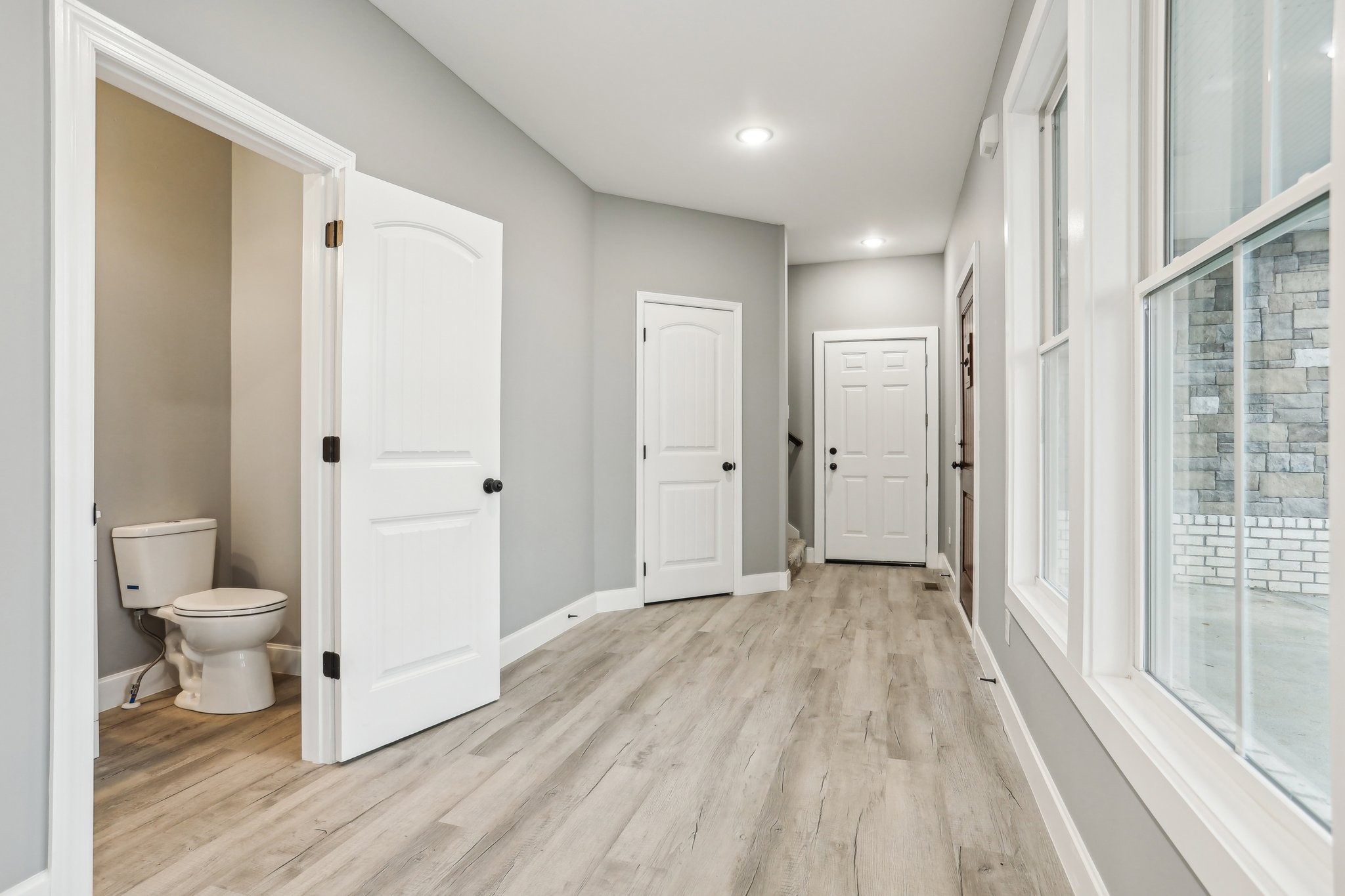 304 Fountainhead Road Portland, TN 37148 - Photo 20 of 38 a view of a bathroom with toilet shower and closet area