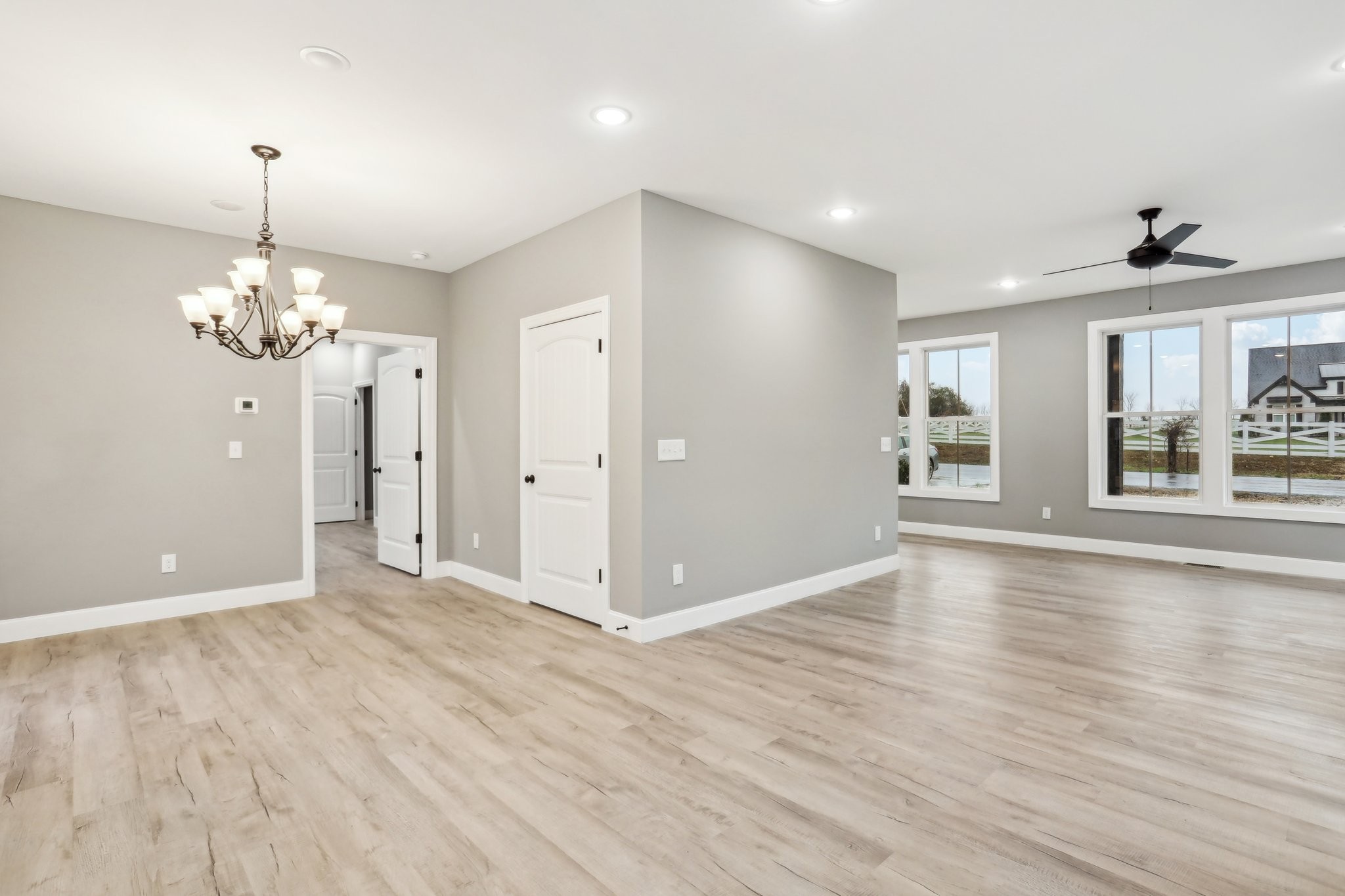 304 Fountainhead Road Portland, TN 37148 - Photo 6 of 38 a view of an empty room with window and wooden floor