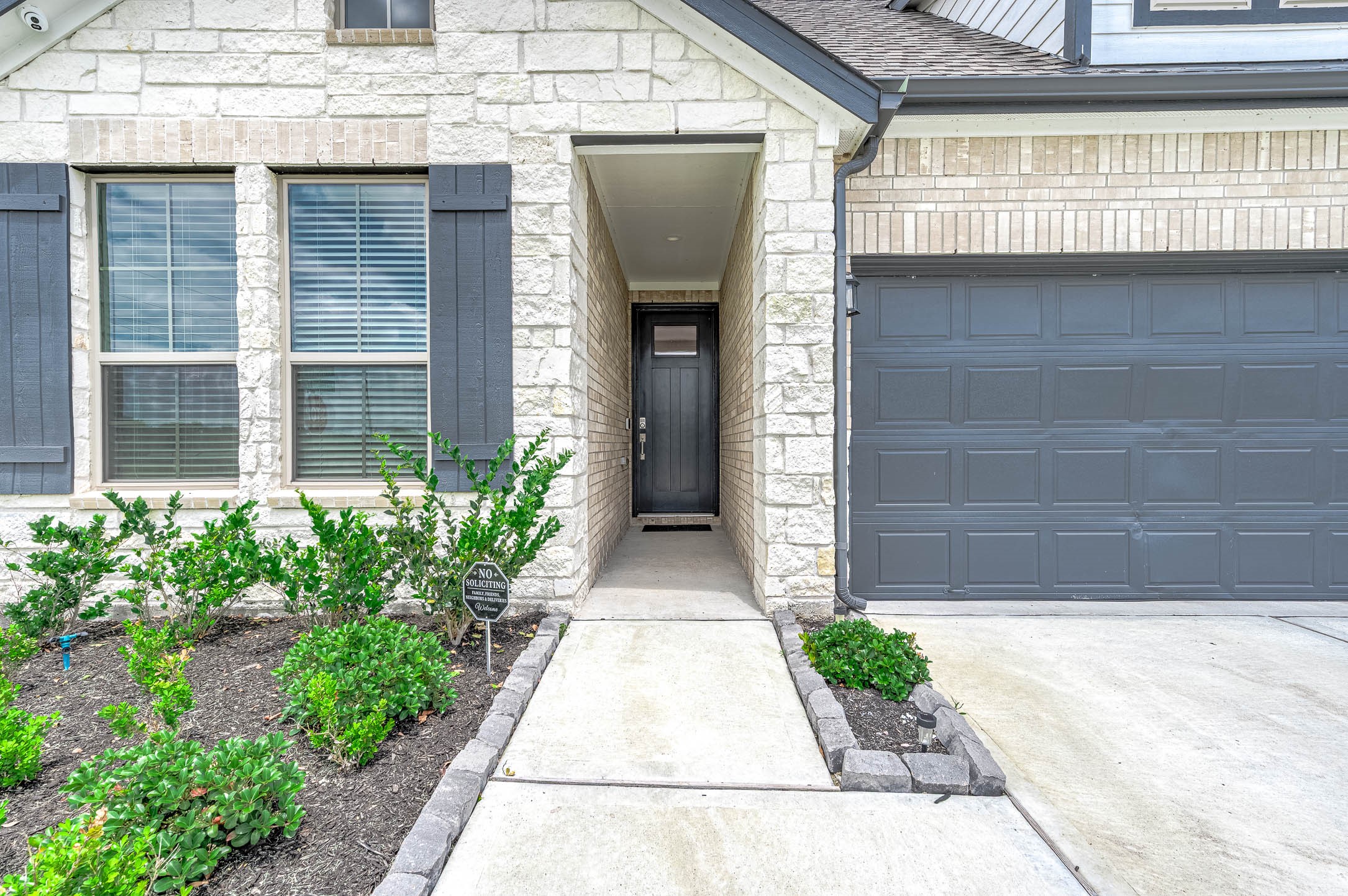 10926 Wander Way Beasley, TX 77417 - Photo 2 of 38 a front view of a house with garden