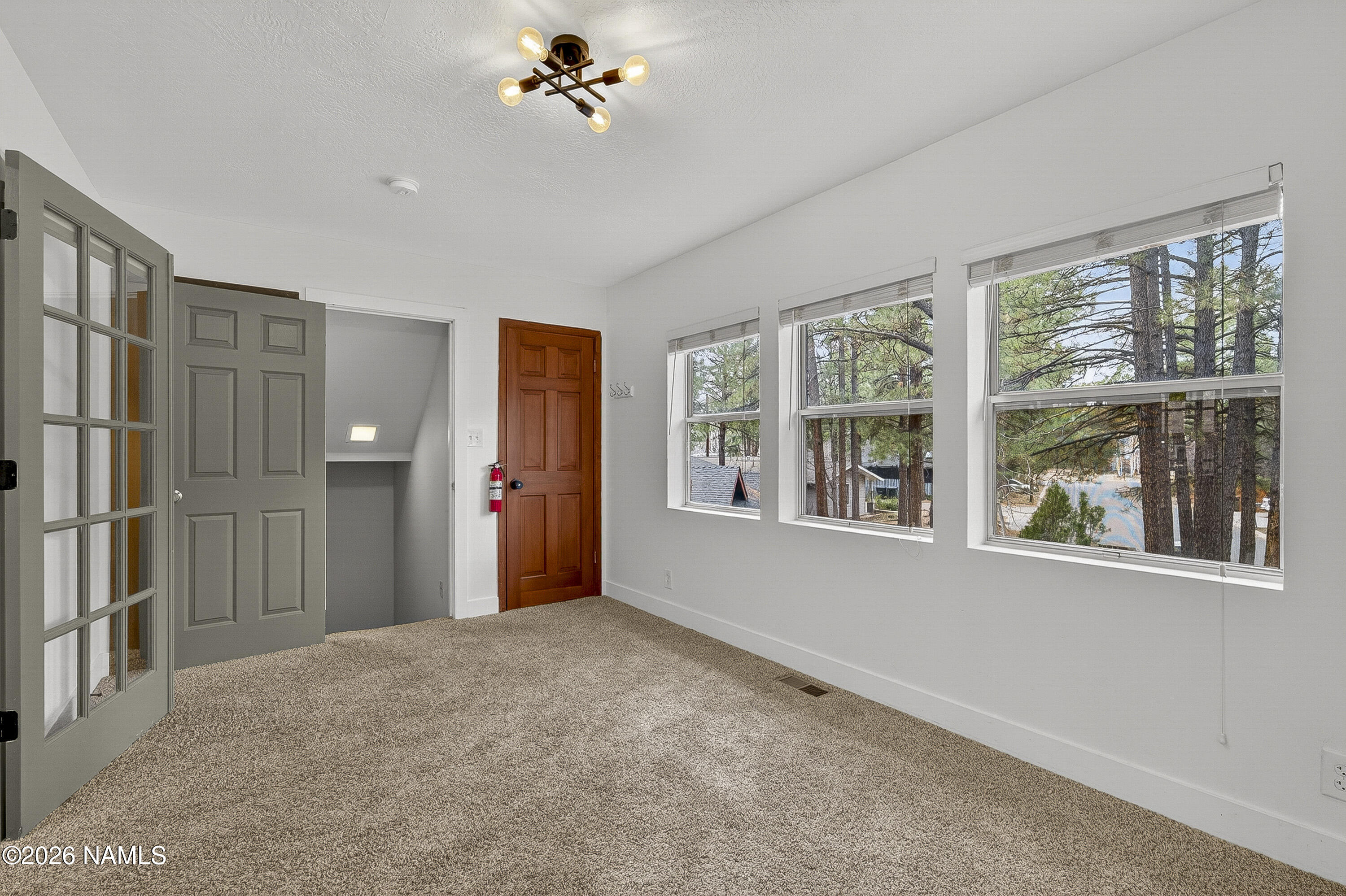 530 East Charles Road Flagstaff, AZ 86001 - Photo 30 of 54 a view of an empty room with a window