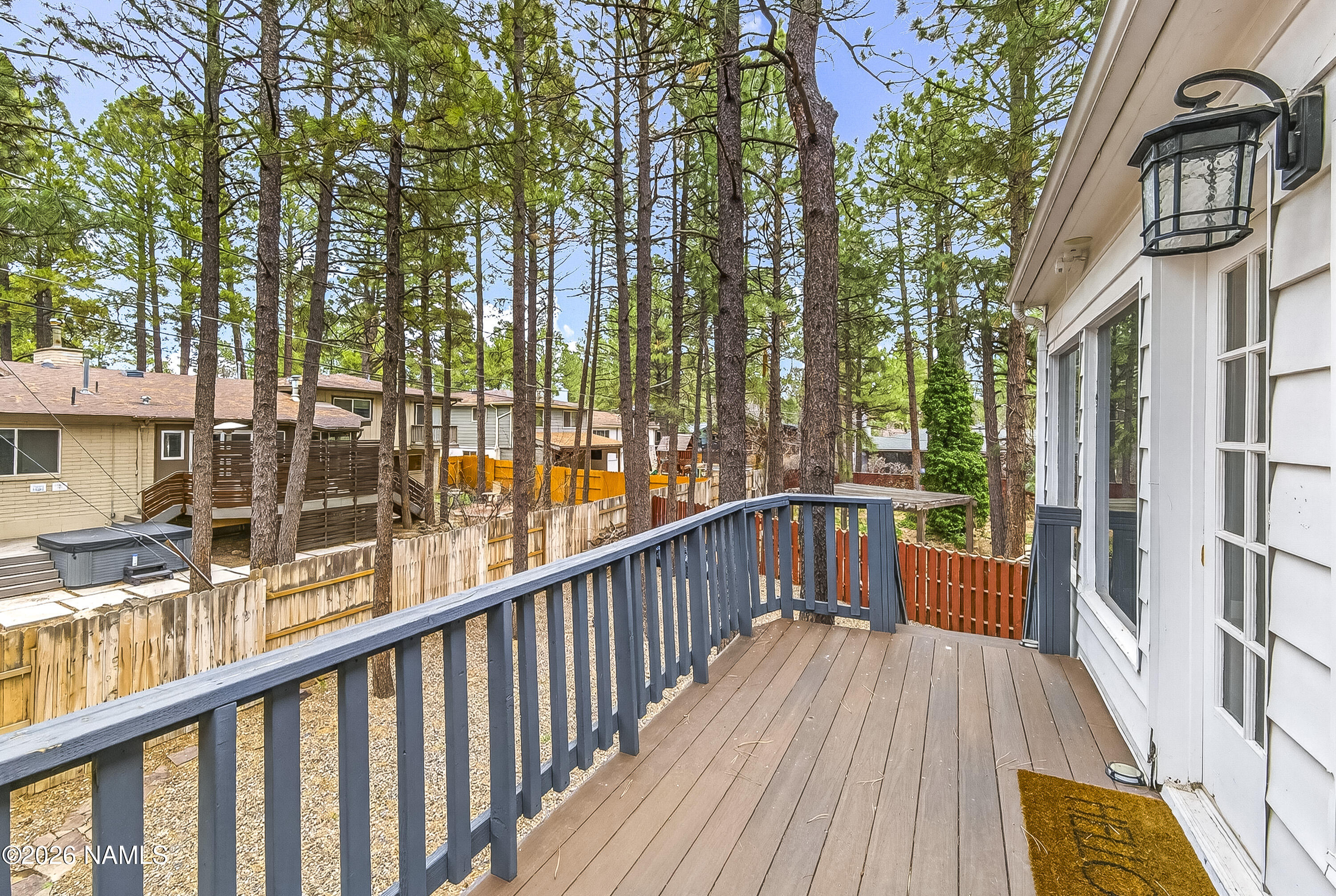 530 East Charles Road Flagstaff, AZ 86001 - Photo 44 of 54 a view of a balcony with wooden floor and fence