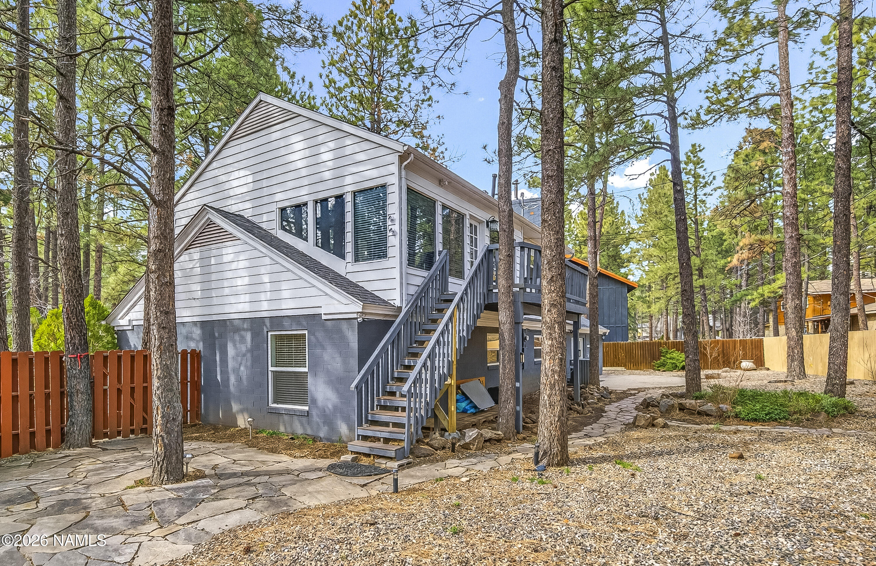 530 East Charles Road Flagstaff, AZ 86001 - Photo 45 of 54 a view of a house with a yard