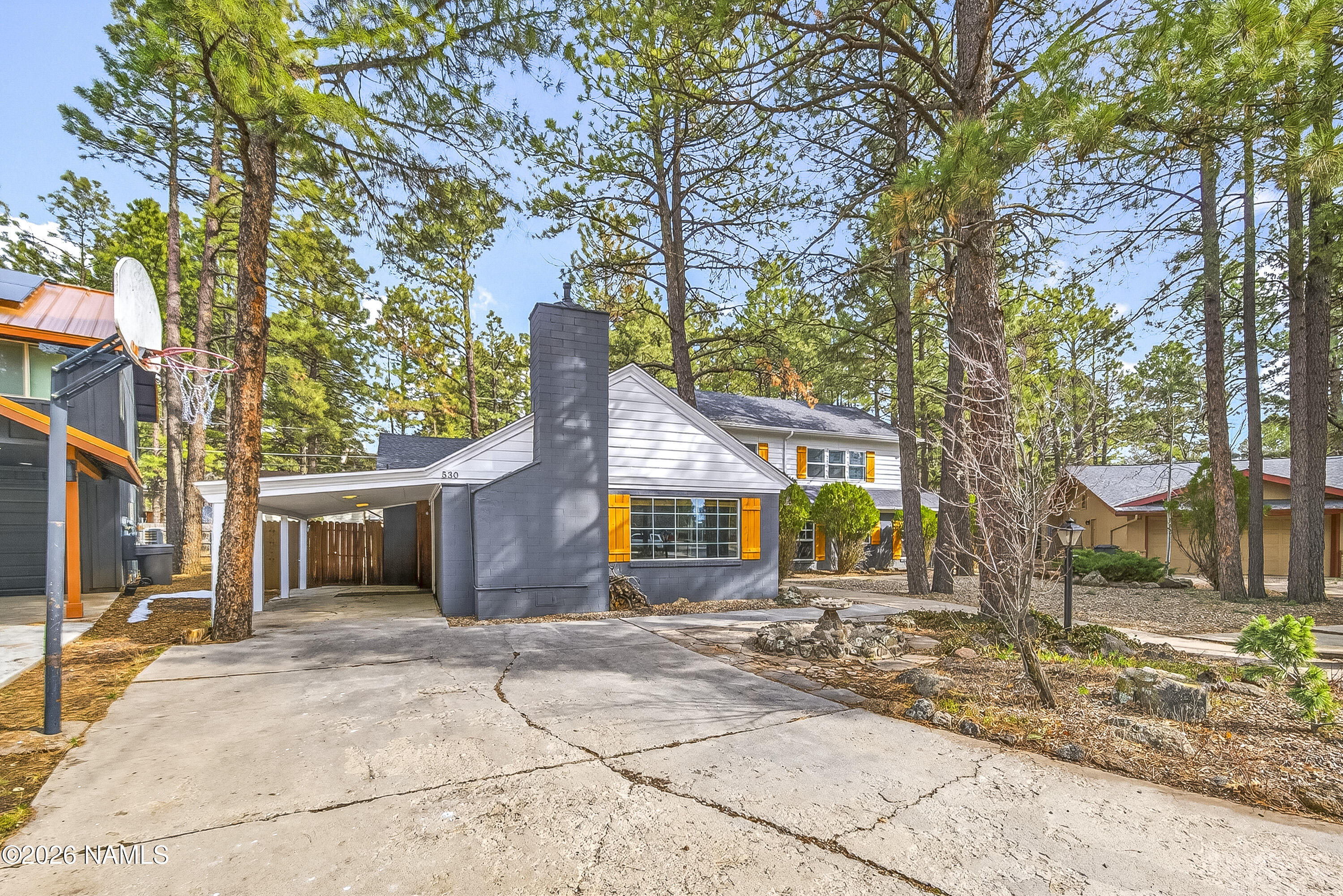 530 East Charles Road Flagstaff, AZ 86001 - Photo 52 of 54 a front view of a house with a yard