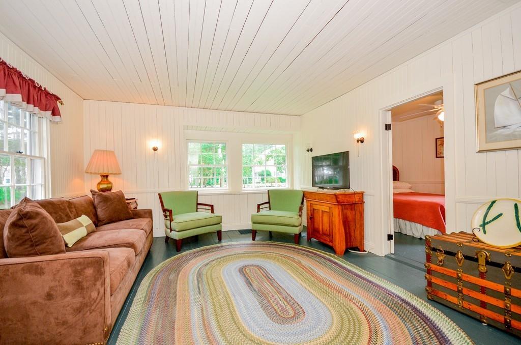 125 Converse Road Marion, MA 02738 - Photo 9 of 40 a living room with furniture and a window