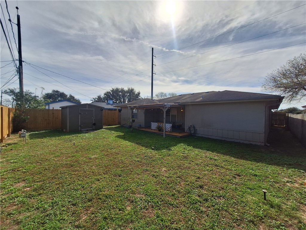 840 Purdue Road Corpus Christi, TX 78418 - Photo 4 of 5 a backyard of a house with lots of green space