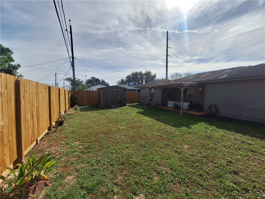 840 Purdue Road Corpus Christi, TX 78418 - Photo 5 of 5 a backyard of a house with lots of green space