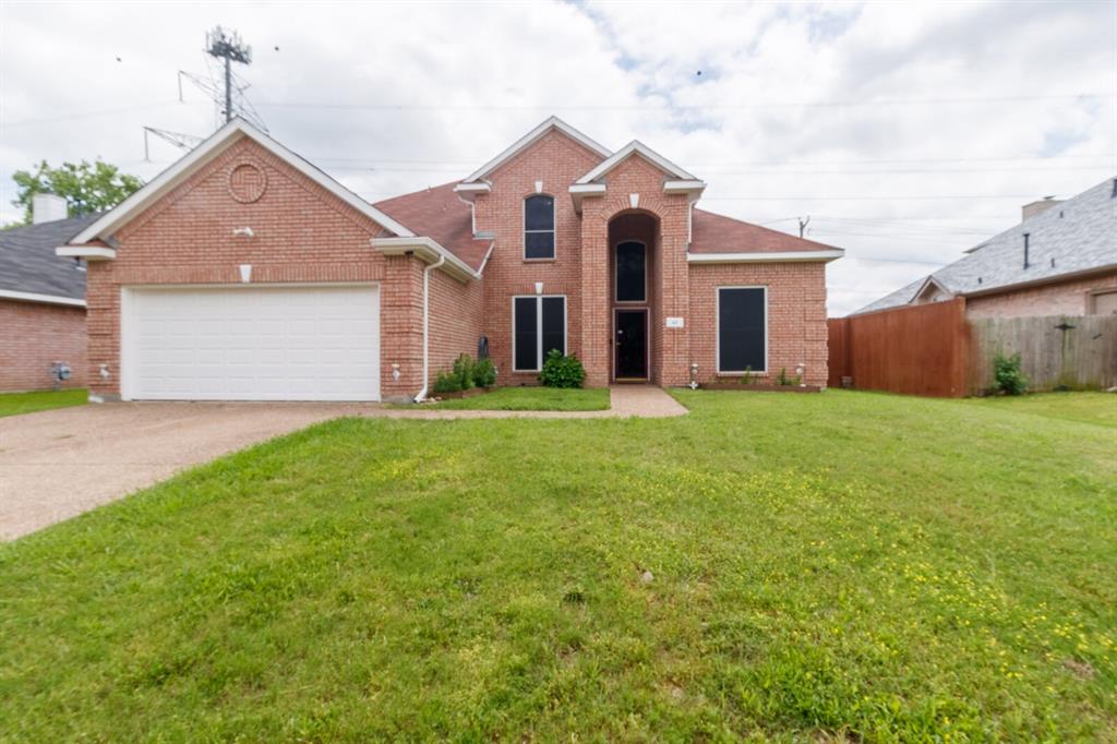 117 Hanover Street Grand Prairie, TX 75052 - Photo 1 of 1 a front view of a house with a yard and garage