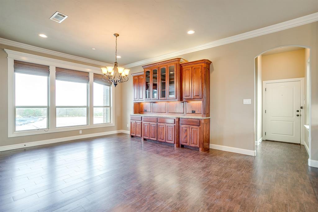 1600 Oak Ridge Estates Weatherford, TX 76085 - Photo 13 of 40 a view of livingroom with furniture window and wooden floor