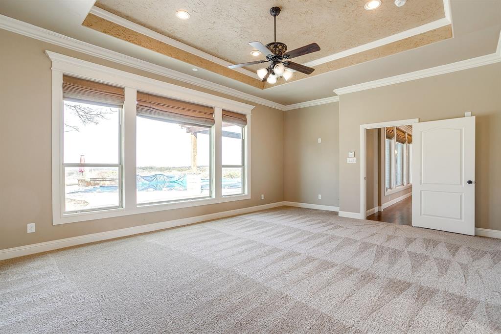 1600 Oak Ridge Estates Weatherford, TX 76085 - Photo 22 of 40 a view of an empty room with a window