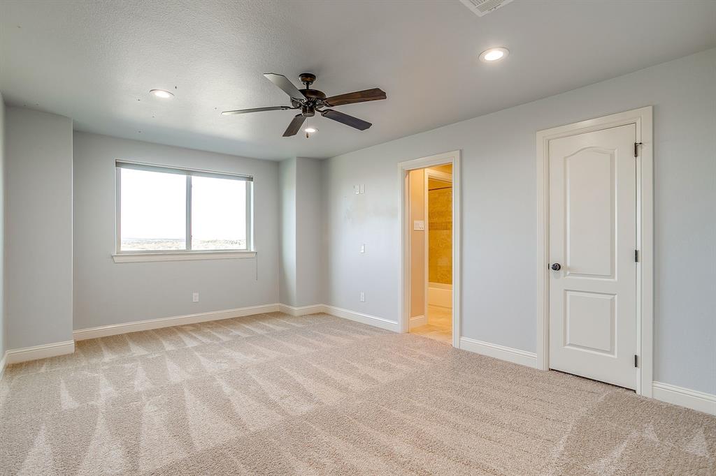 1600 Oak Ridge Estates Weatherford, TX 76085 - Photo 30 of 40 a view of an empty room with a window