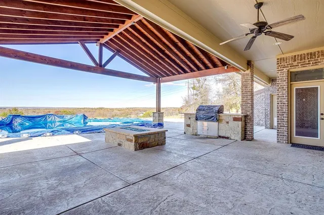 a view of an outdoor space with porch area