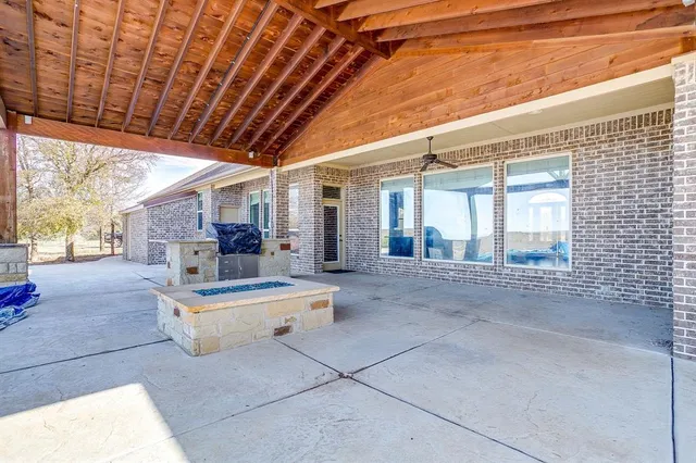 a house with swimming pool in front of it