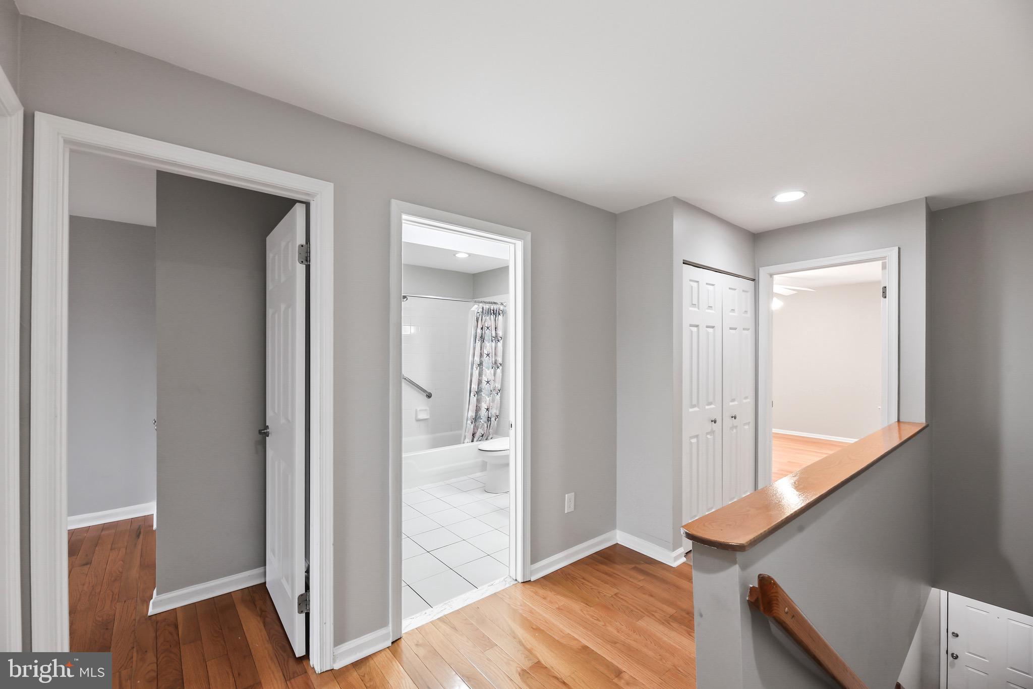 6218 Lindbergh Blvd. Philadelphia, PA 19142 - Photo 12 of 17 a view of hallway with wooden floor