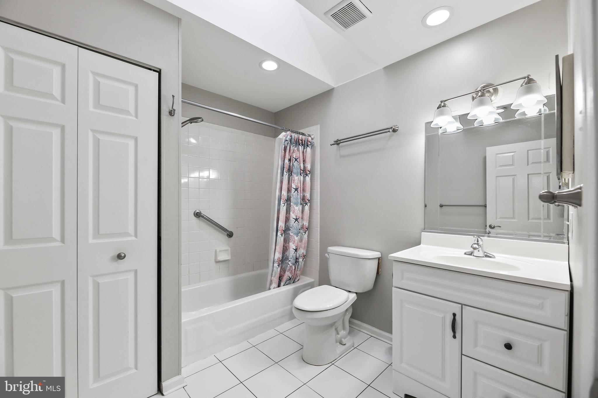 6218 Lindbergh Blvd. Philadelphia, PA 19142 - Photo 13 of 17 a bathroom with a sink a toilet and shower