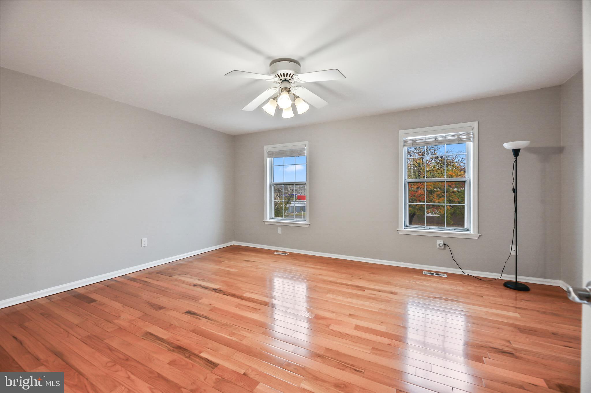 6218 Lindbergh Blvd. Philadelphia, PA 19142 - Photo 10 of 17 a view of an empty room with window and wooden floor