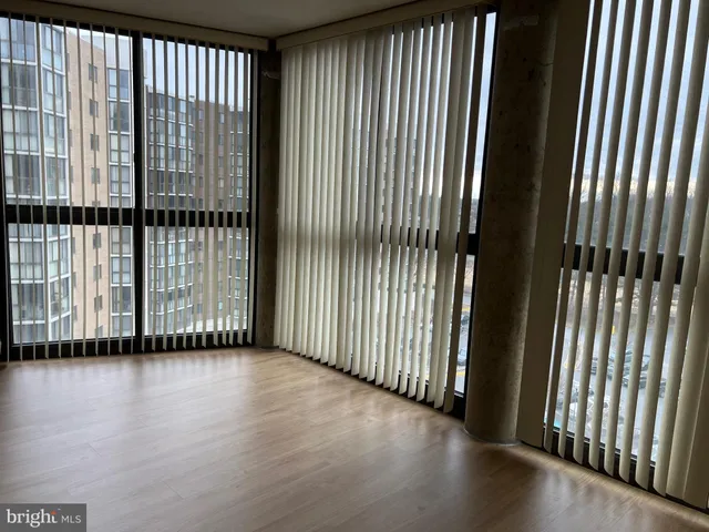 a view of a black and white floor to ceiling window