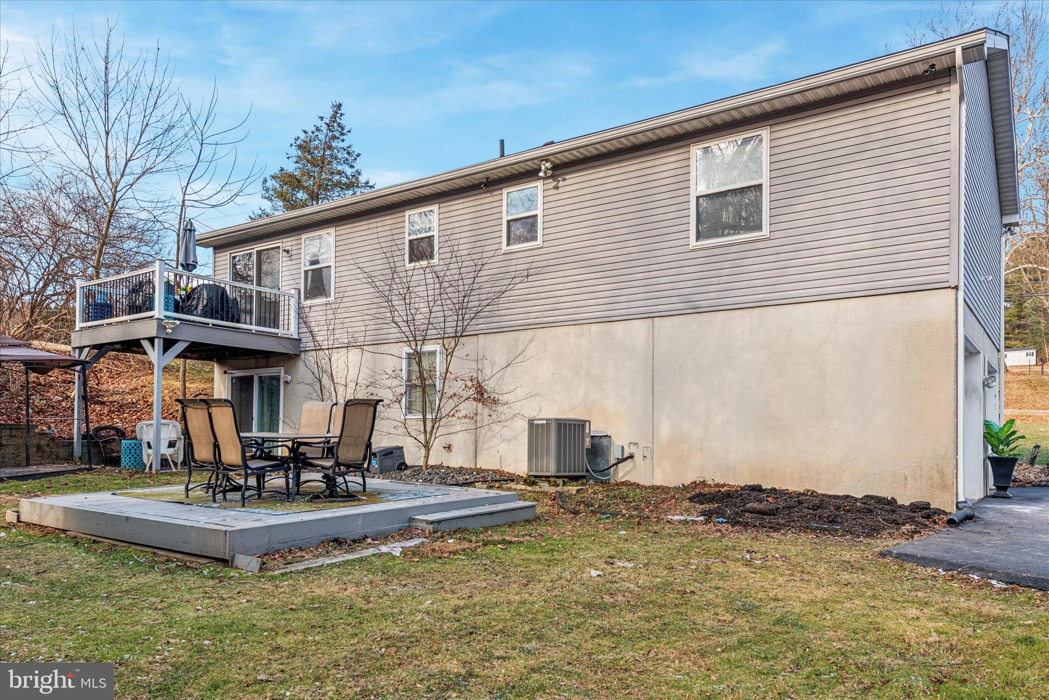 1430 South Bailey Road Coatesville, PA 19320 - Photo 32 of 37 a view of a house with pool and chairs