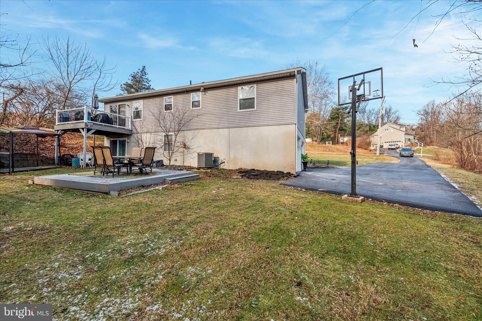 1430 South Bailey Road Coatesville, PA 19320 - Photo 33 of 37 a view of a patio with table and chairs near a yard