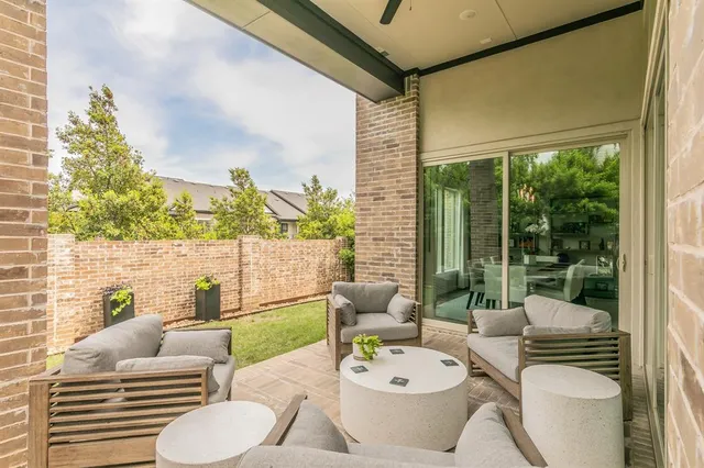 a outdoor living space with furniture and garden view