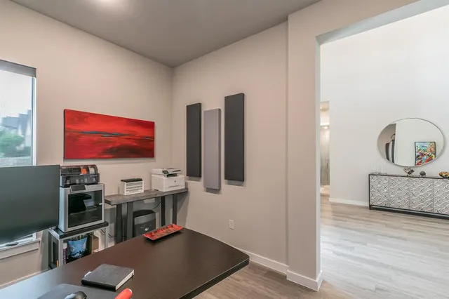 a room with furniture and wooden floor