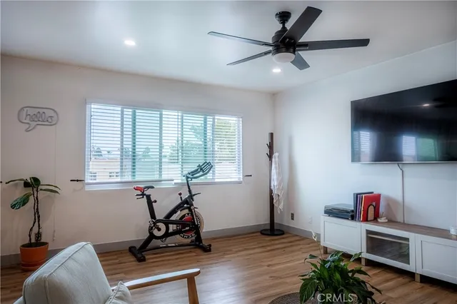 a room with furniture and a flat screen tv