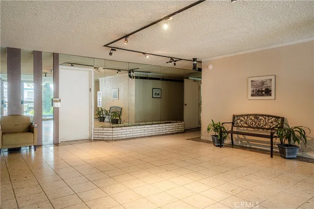 a view of livingroom with furniture and natural light
