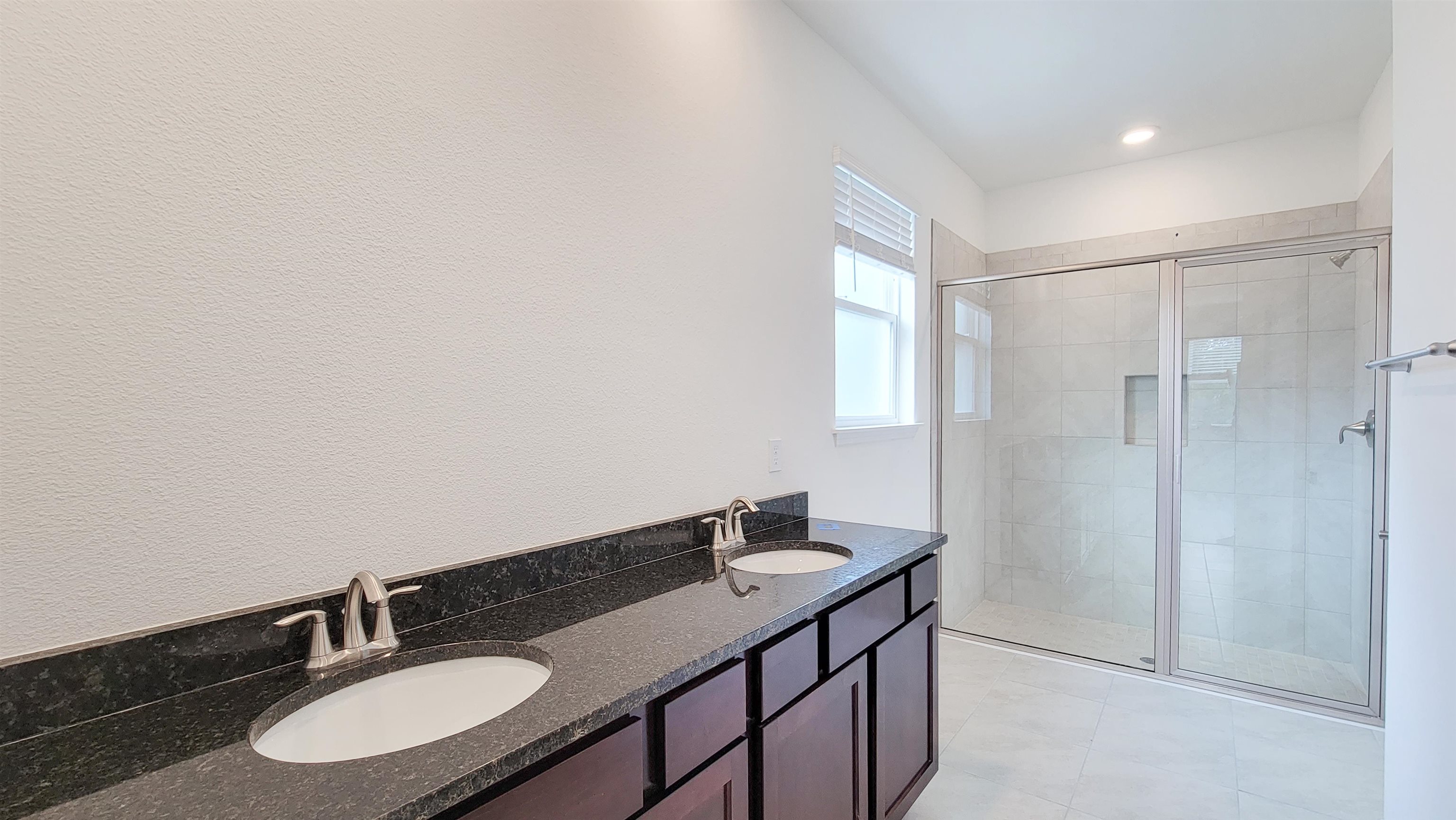 62 Roxboro Drive Palm Coast, FL 32164 - Photo 21 of 35 a bathroom with a sink and a mirror
