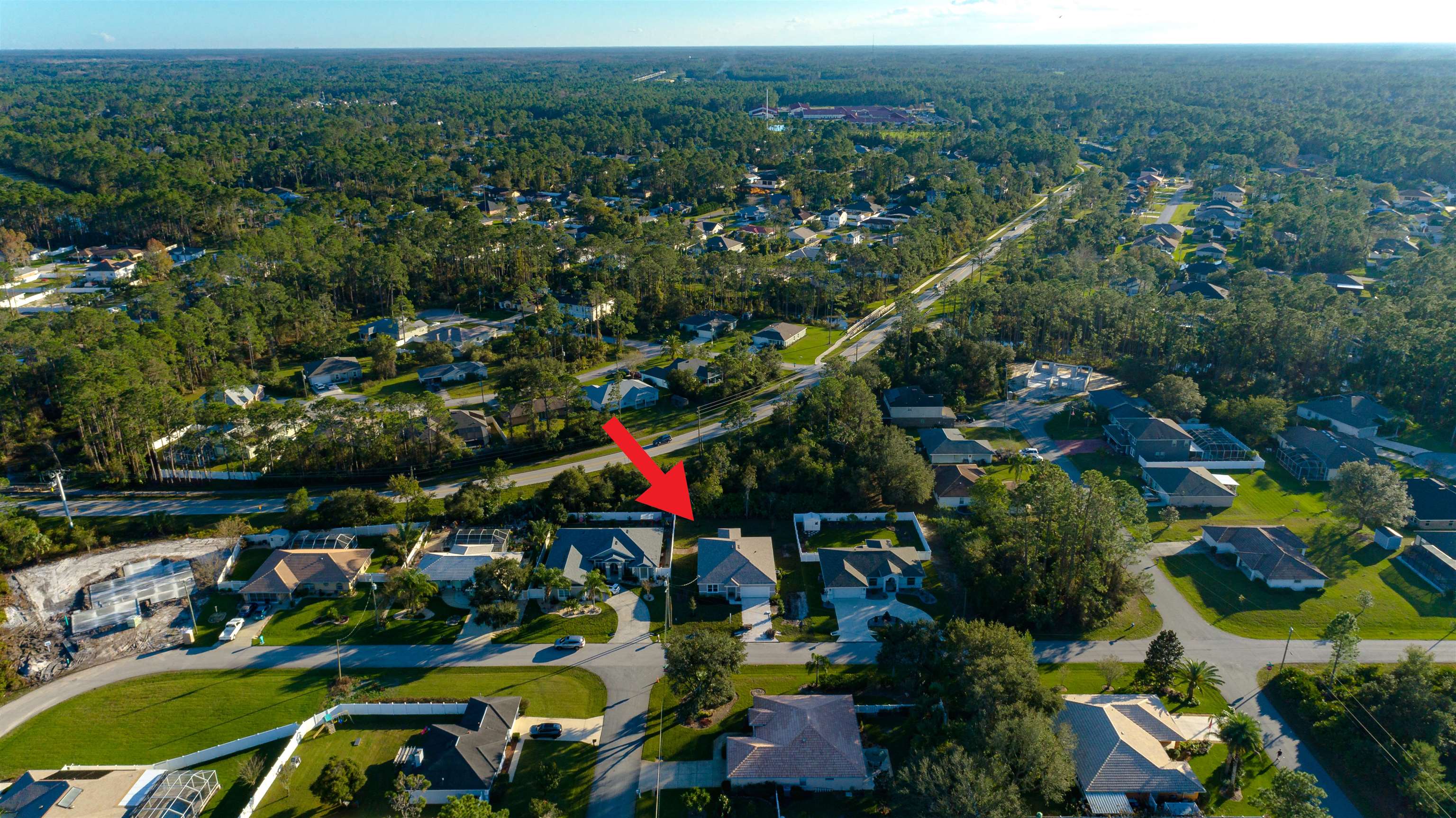 62 Roxboro Drive Palm Coast, FL 32164 - Photo 30 of 35 an aerial view of a houses with a yard