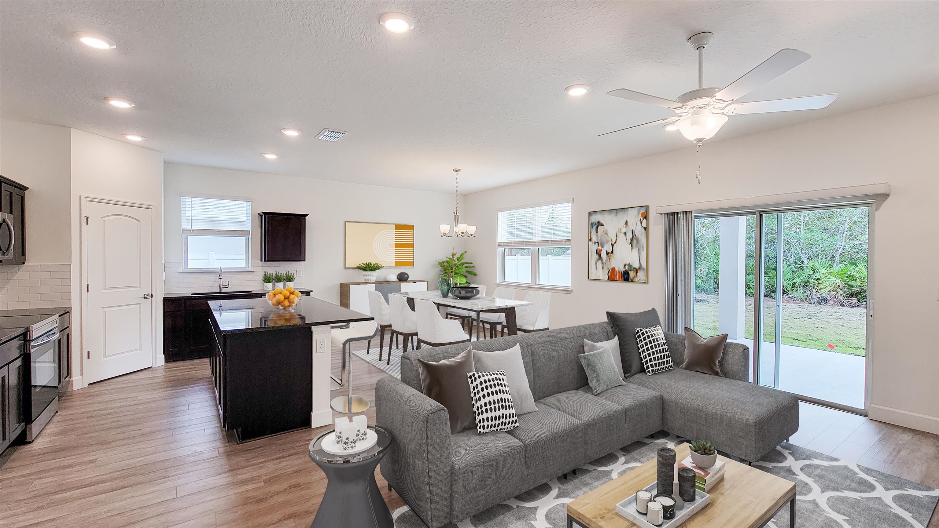 62 Roxboro Drive Palm Coast, FL 32164 - Photo 3 of 35 a living room with furniture and a large window