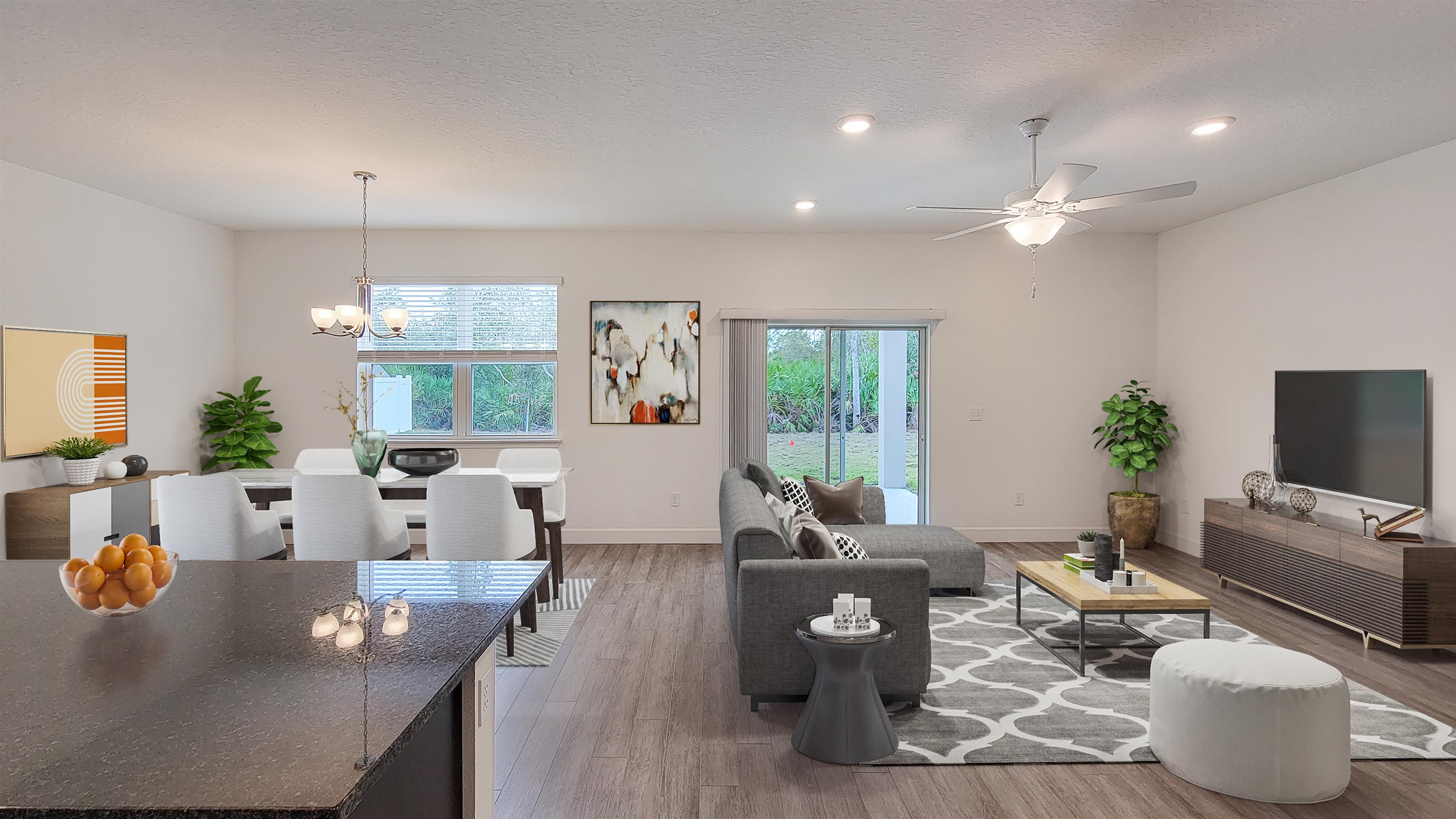 62 Roxboro Drive Palm Coast, FL 32164 - Photo 4 of 35 a living room with furniture and a flat screen tv