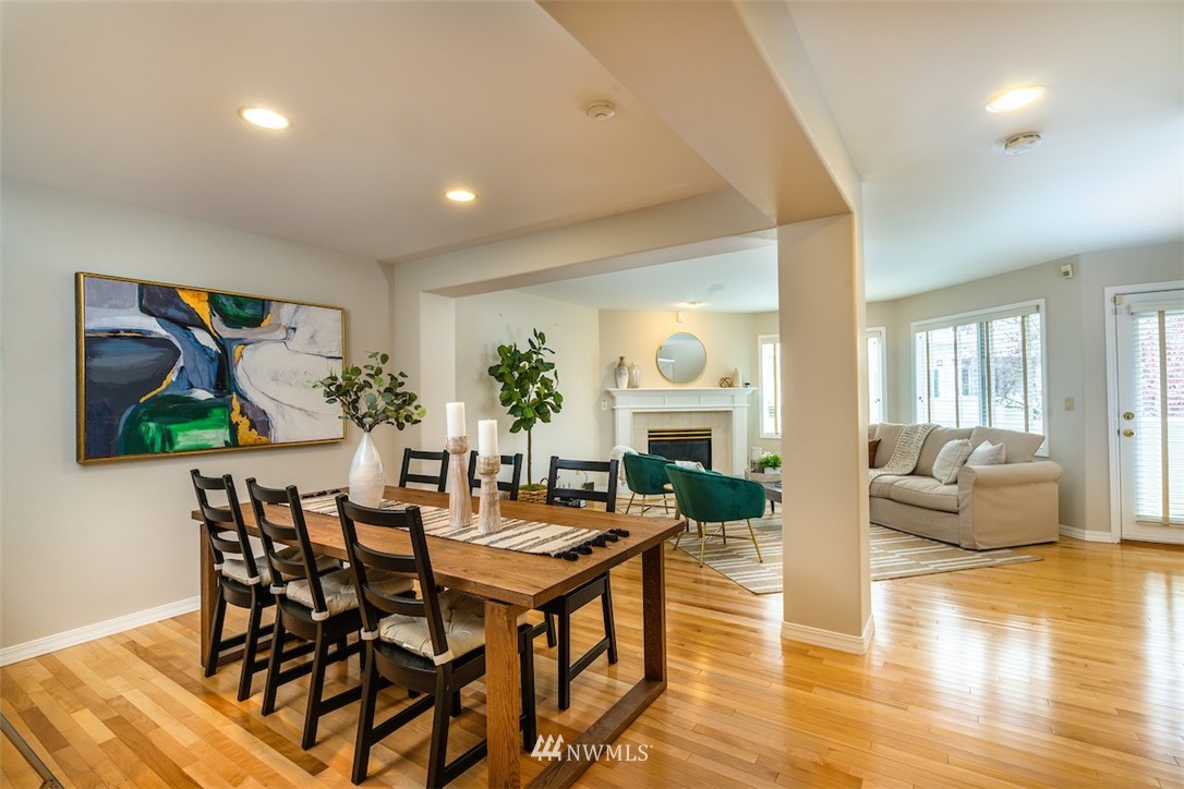 7323 Old Redmond Road, Unit 6 Redmond, WA 98052 - Photo 5 of 18 a view of a dining room with furniture wooden floor and a potted plant