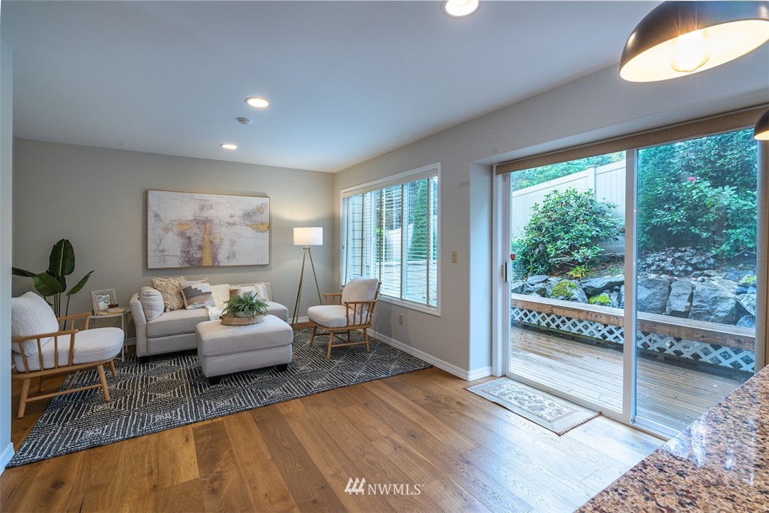 7323 Old Redmond Road, Unit 6 Redmond, WA 98052 - Photo 8 of 18 a living room with furniture and a large window