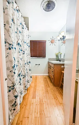 a living room with a couch and a flat screen tv