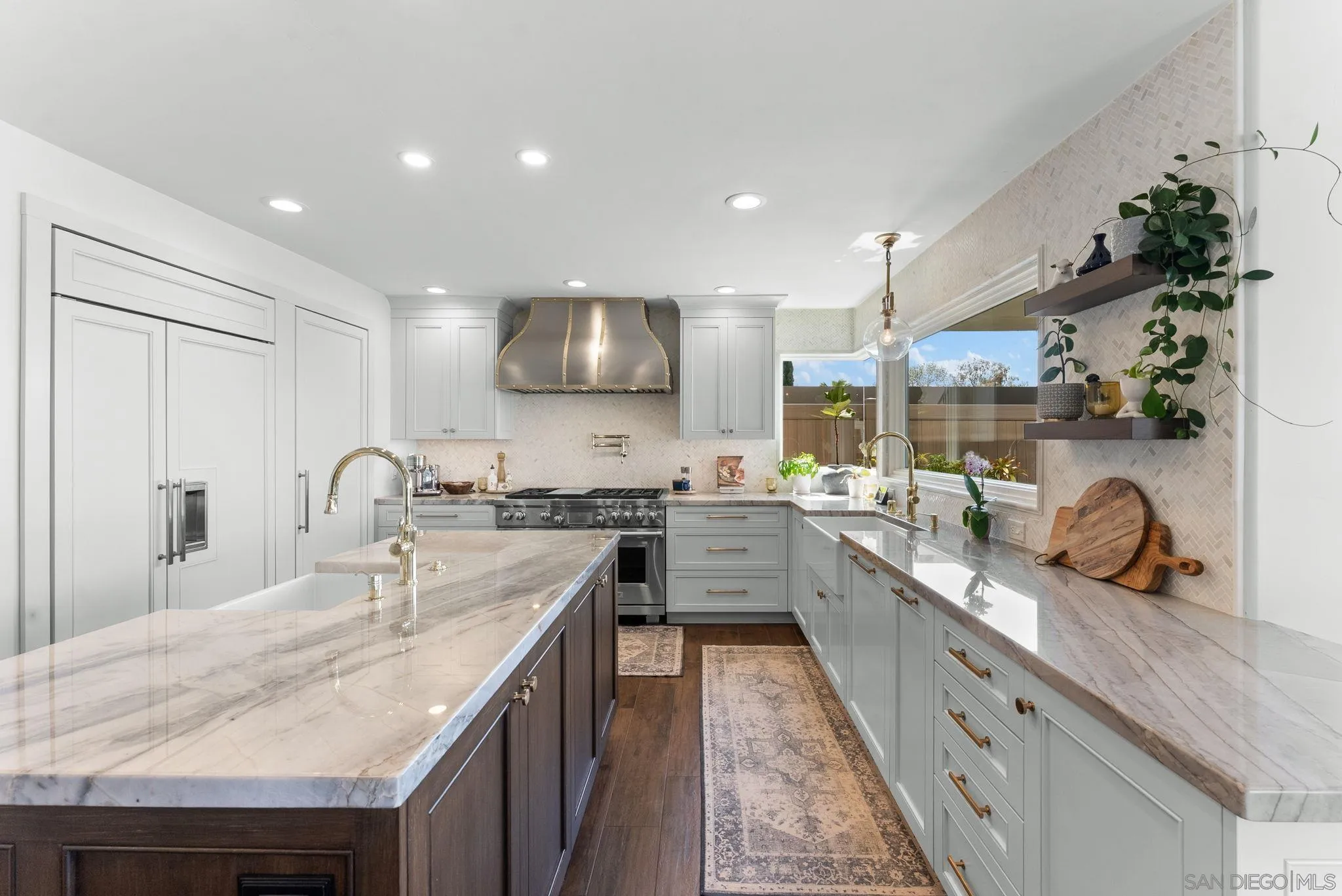 4136 Palisades Road San Diego, CA 92116 - Photo 14 of 68 a kitchen with sink stove and cabinets