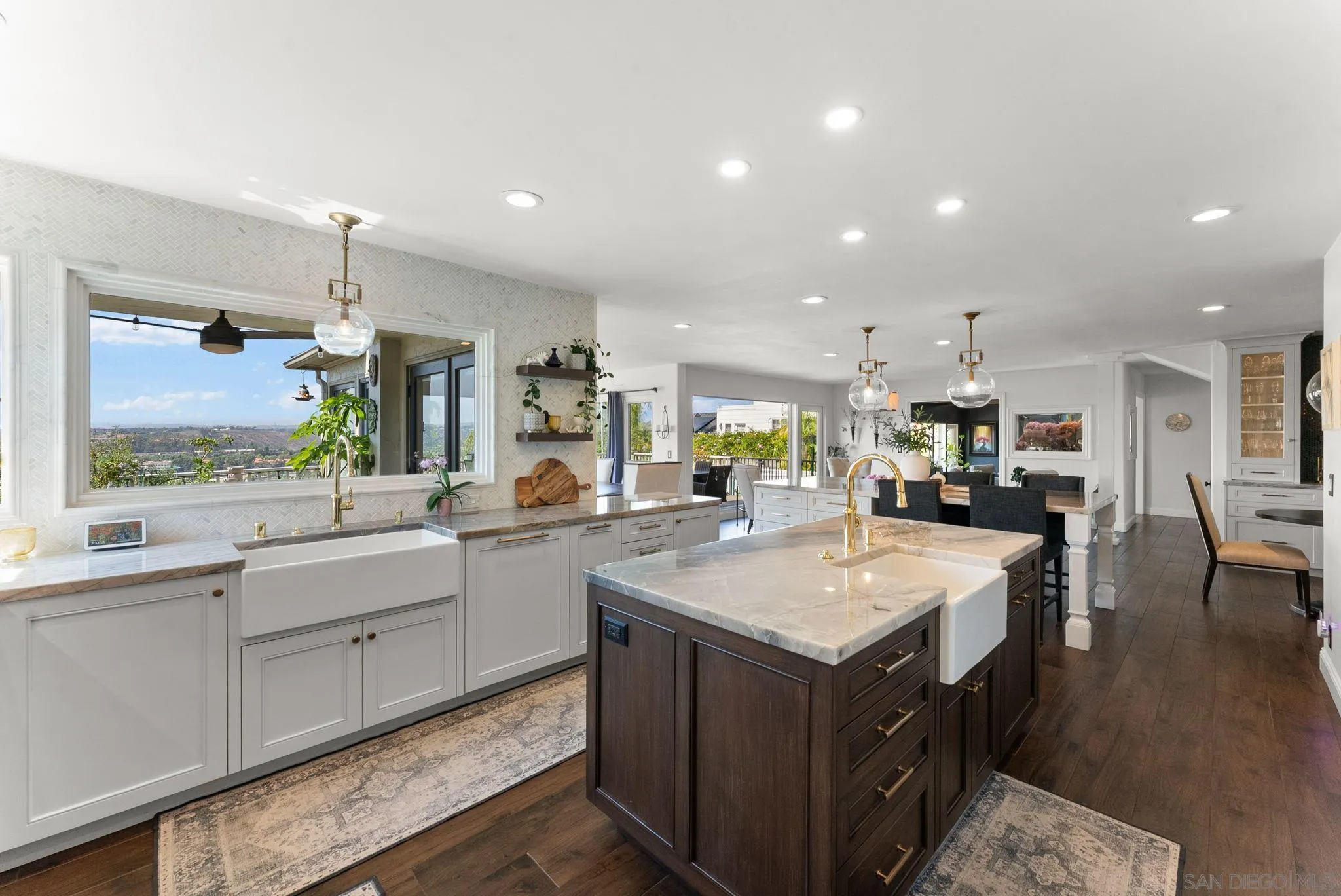 4136 Palisades Road San Diego, CA 92116 - Photo 17 of 68 a kitchen with sink and center island