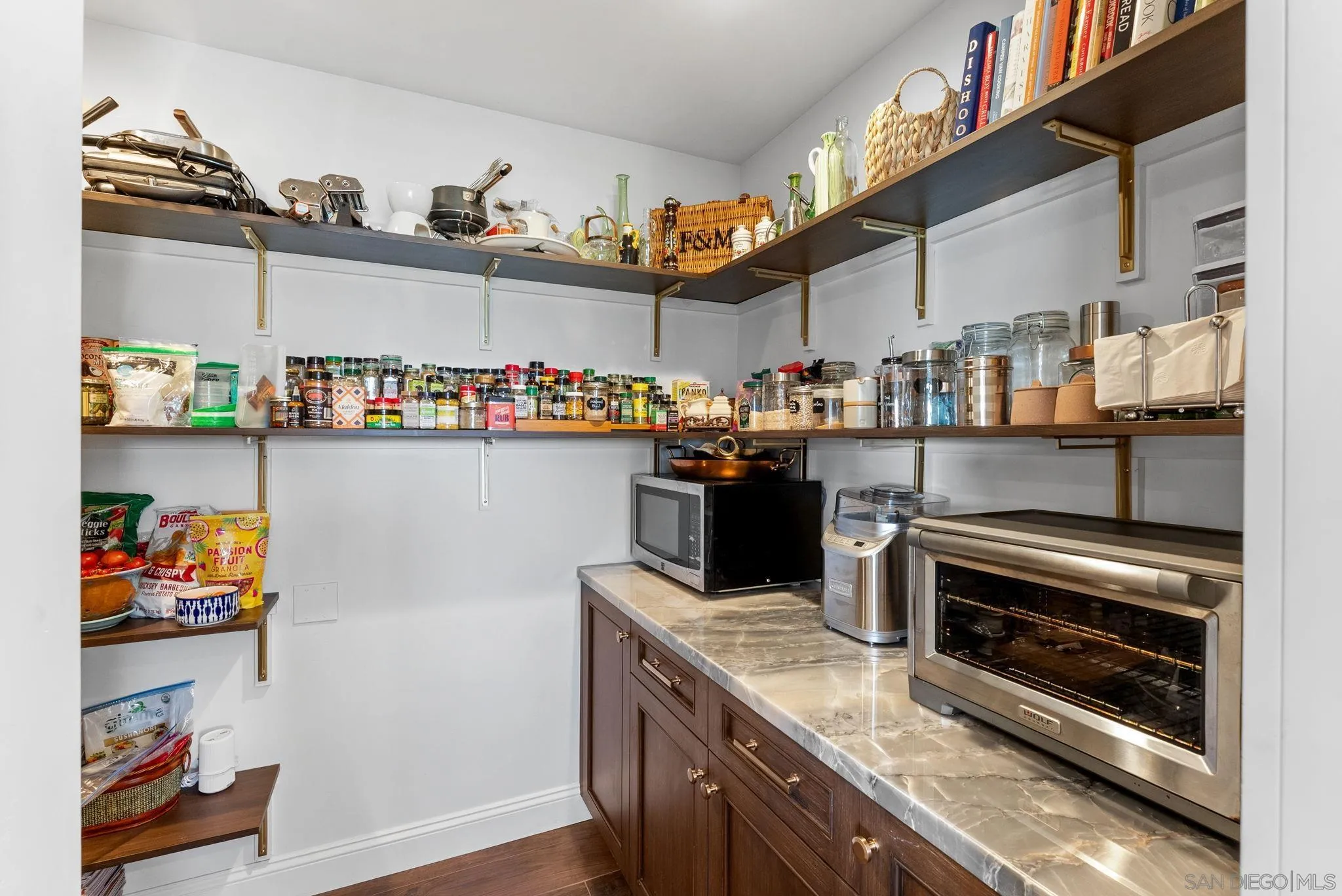 4136 Palisades Road San Diego, CA 92116 - Photo 19 of 68 a kitchen with stainless steel appliances granite countertop a stove and cabinets