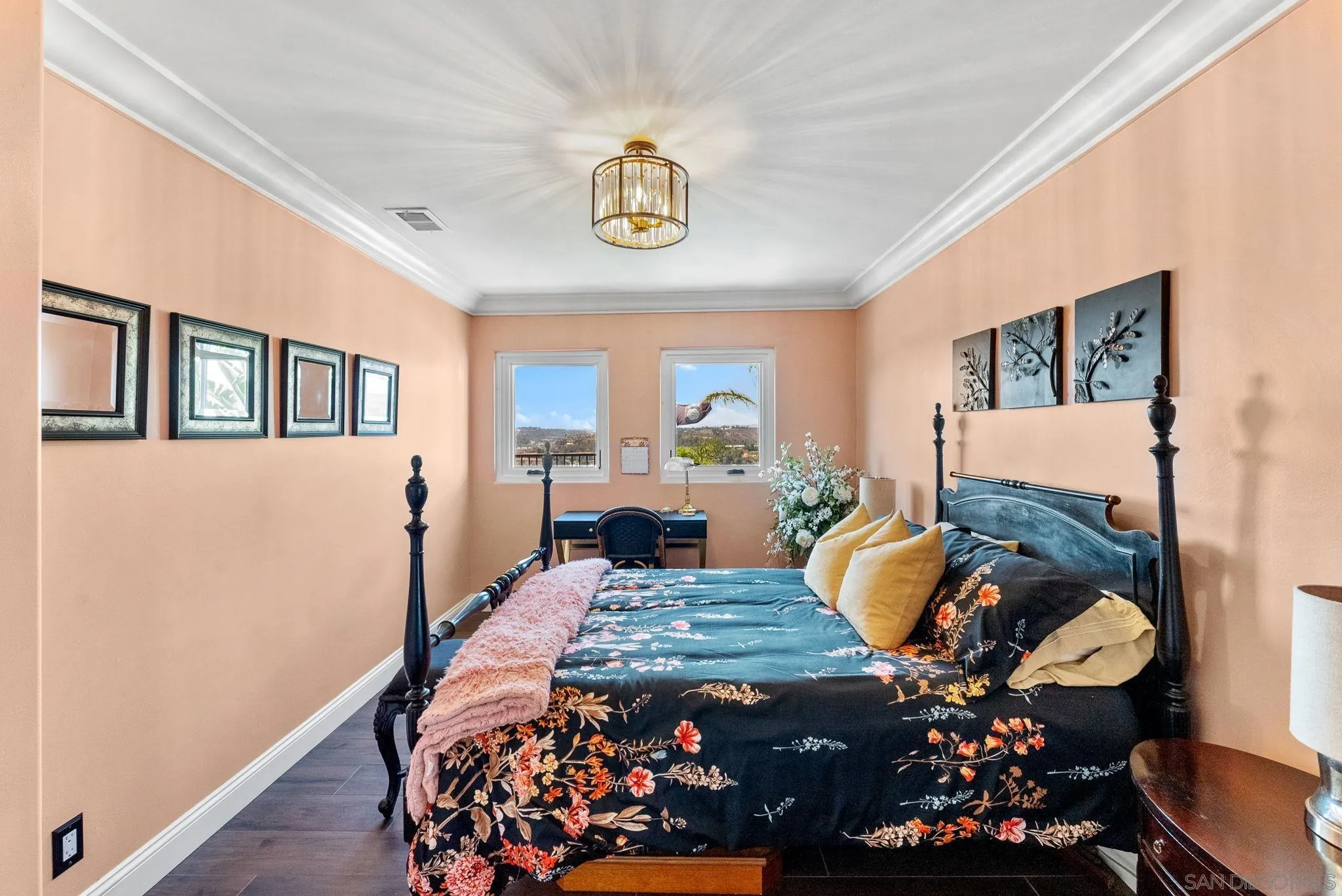 4136 Palisades Road San Diego, CA 92116 - Photo 41 of 68 a bedroom with a bed and wooden floor