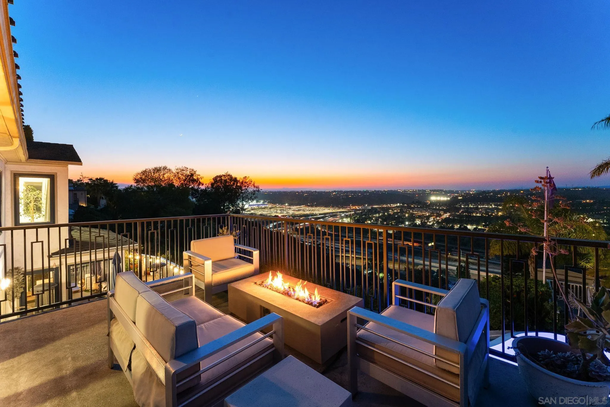 4136 Palisades Road San Diego, CA 92116 - Photo 60 of 68 a view of a roof deck with couches and sky view