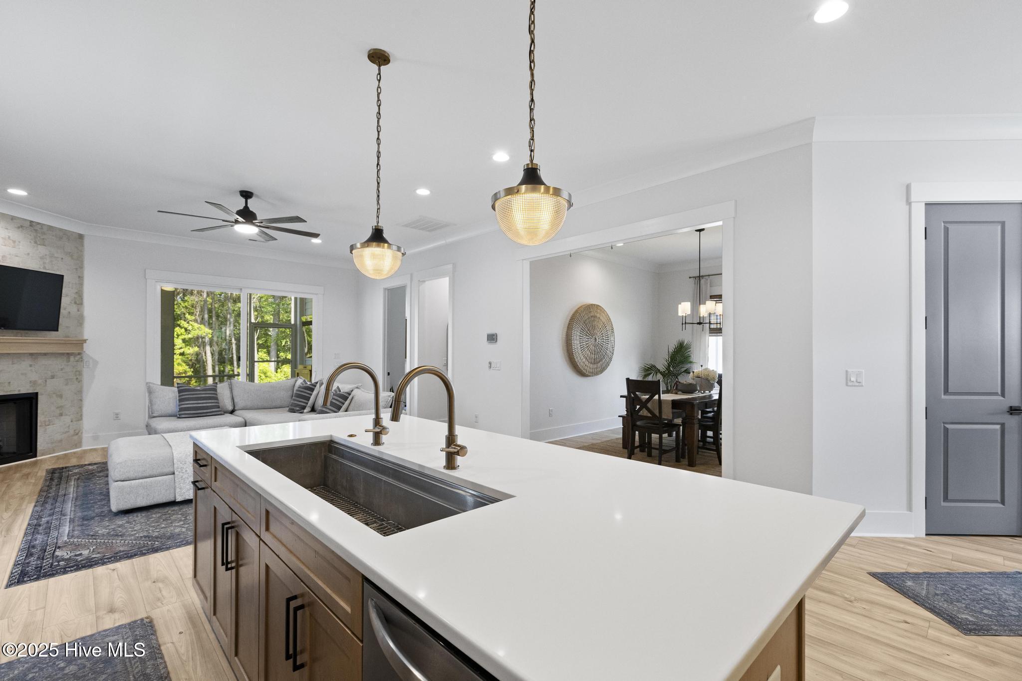 510 White Picket Way Holly Ridge, NC 28445 - Photo 21 of 63 Dual-Fuel Z-Line Range, 5 ft kitchen sink (dual faucet), poplar floating shelves, wood-shelved pantry