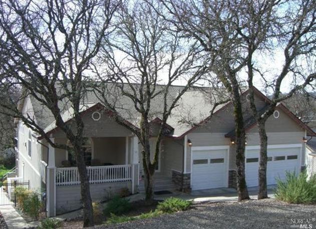18939 Moon Ridge Road Hidden Valley Lake, CA 95467 - Photo 1 of 1 a front view of a house with garden