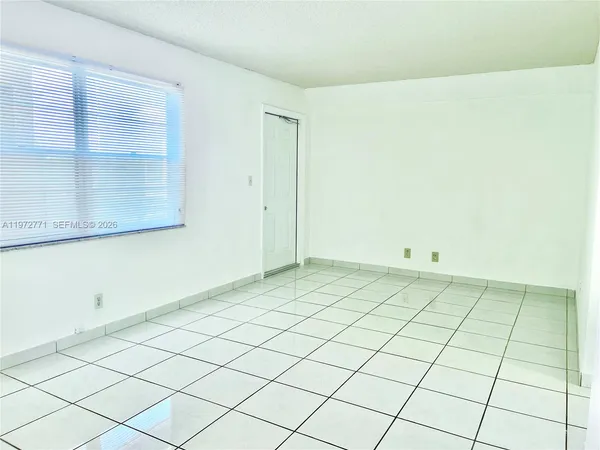 a view of a room and window