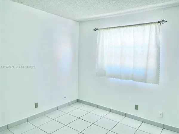 a view of a room & utility room