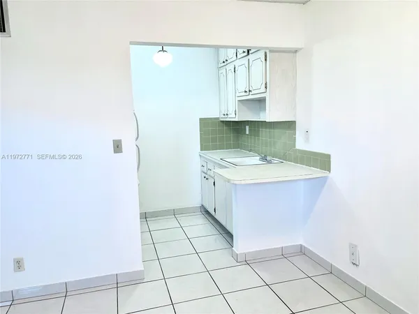 a view of a room & utility room