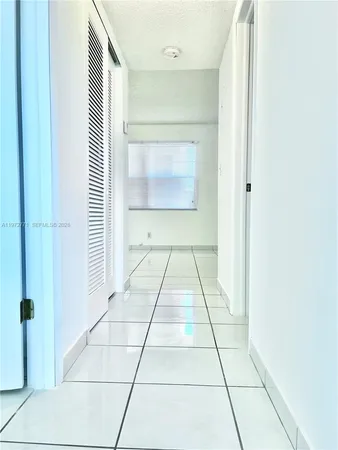 a view of entryway with white walls