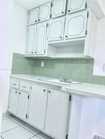 a view of white cabinets