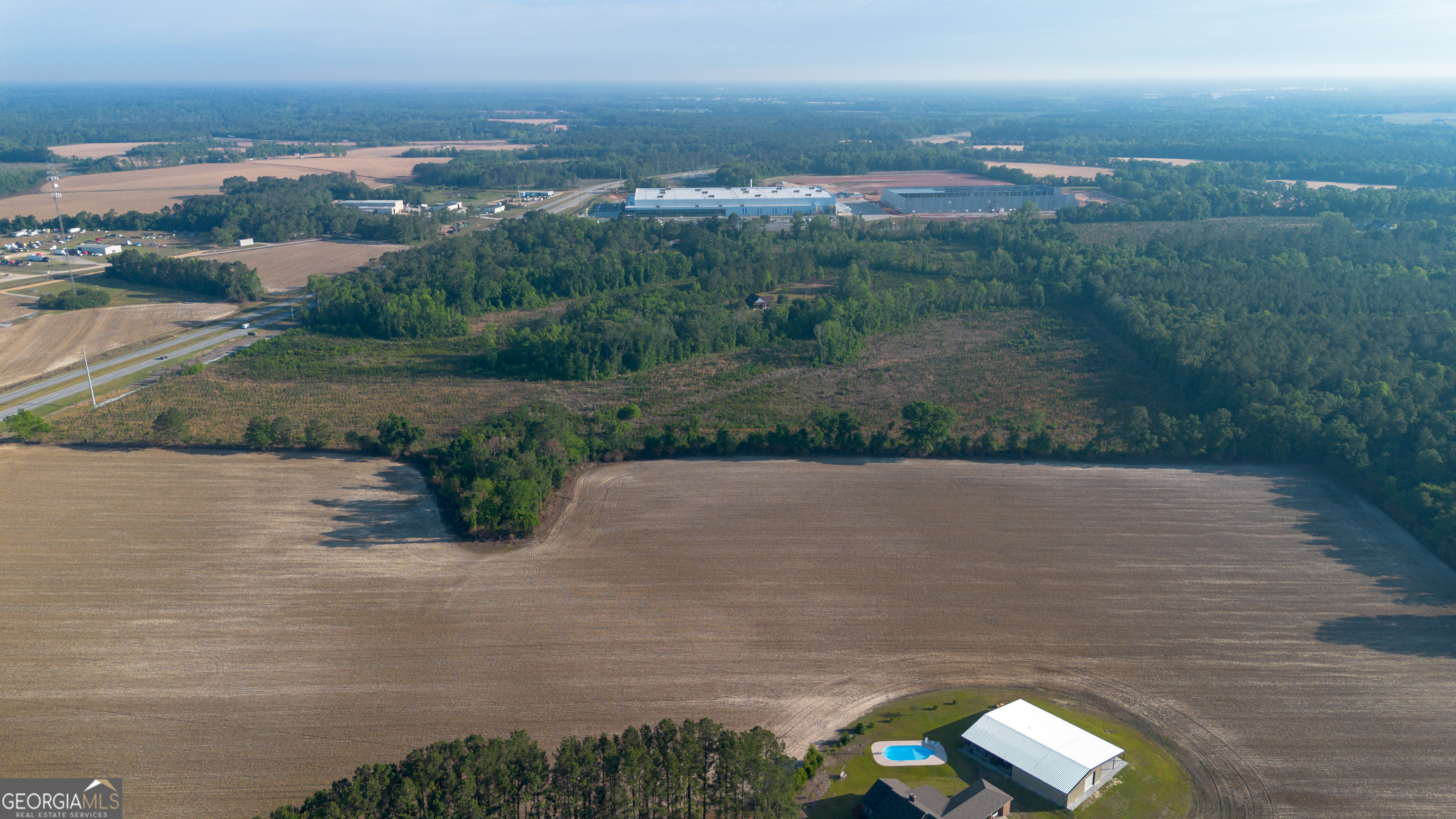 4530 Highway 301 Register, GA 30452 - Photo 9 of 19 a view of a lake with a city view