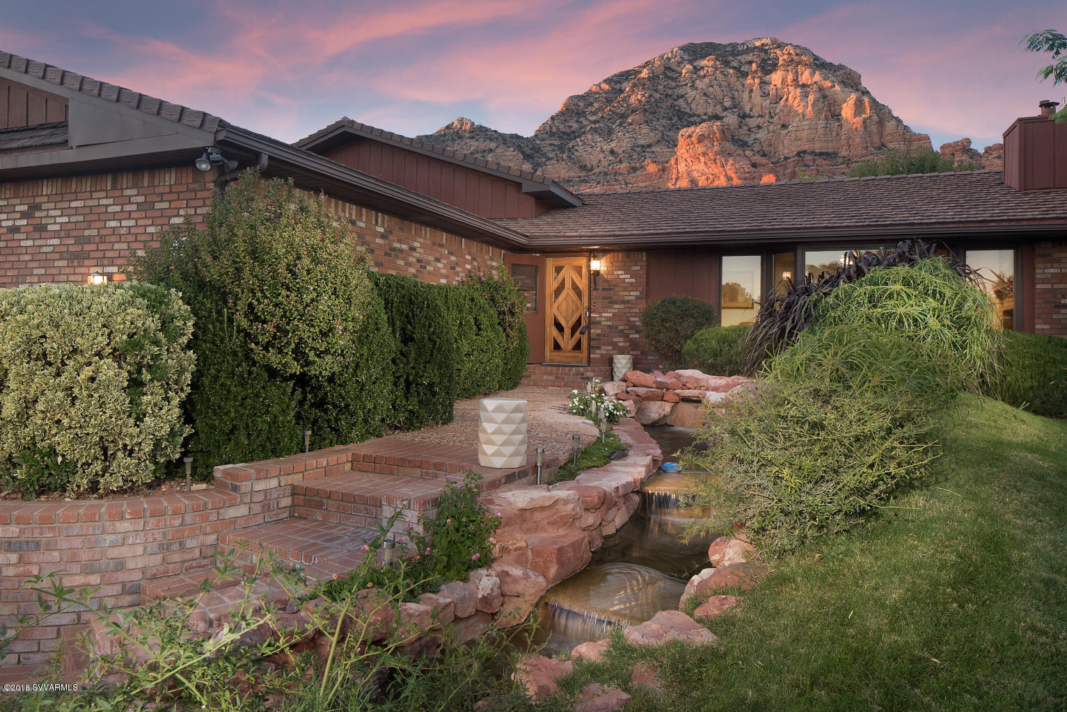 2450 Homestead Road Sedona, AZ 86336 - Photo 1 of 25 a view of a back yard of the house